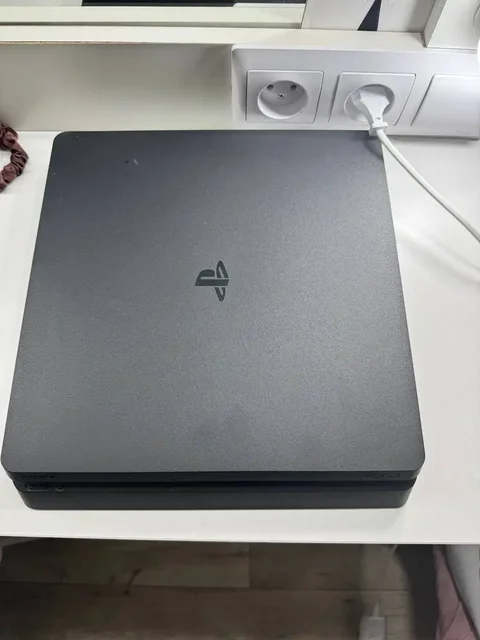 Sony PlayStation 4 Slim - Игровые приставки в Владивосток