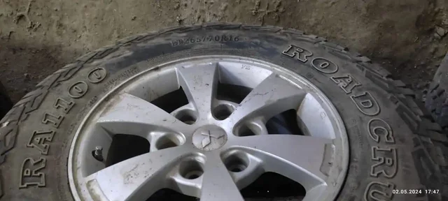 Продам шины с дисками от L200 - Шины в Хабаровск
