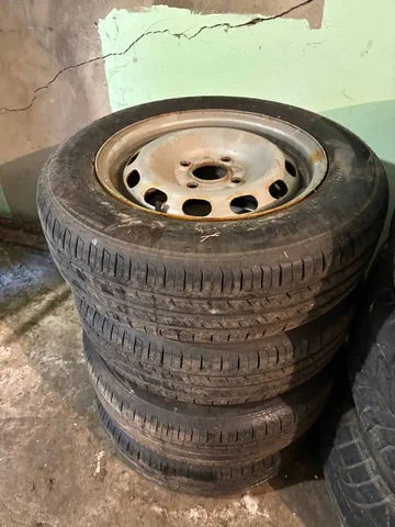 Колеса 175/70 R14 4/100 резина и штампы в отличном состоянии - Автобусы в Тюмень
