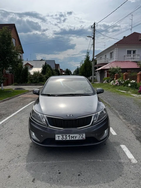 Kia Rio 3 поколения 2011 года в Тюмени - ВАЗ 2114 в Тюмень
