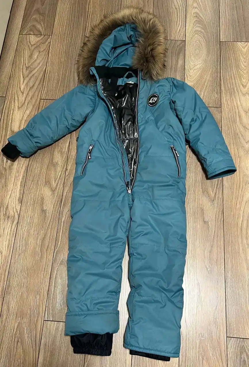 Продам зимний комбез рост 134