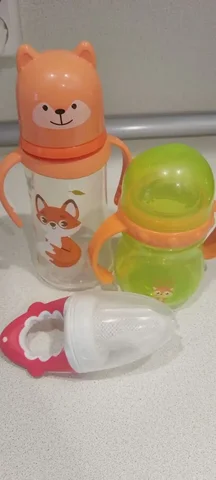 Детские товары: коробка сока, поильник, ниблер - Товары для детей в Чита