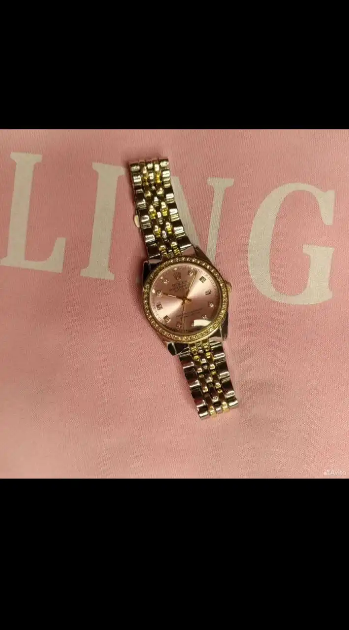 Женские розовые часы Rolex