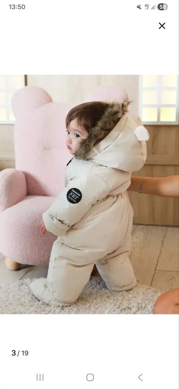 Продам новый зимний комбинезон