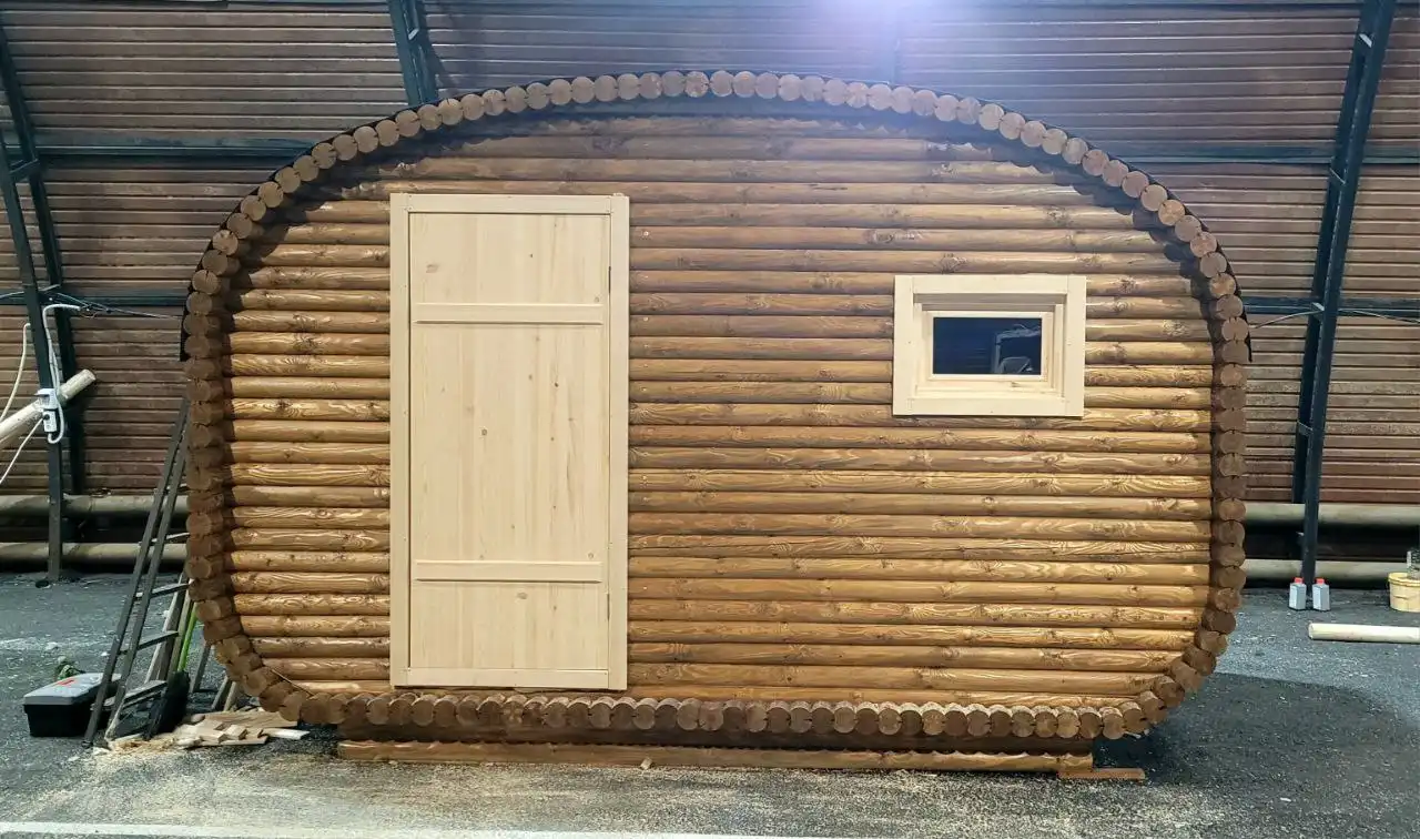 Баня из оцилиндрованного бревна