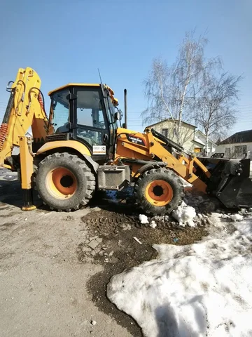 Услуги экскаватора-погрузчика - Строительная техника в Пенза
