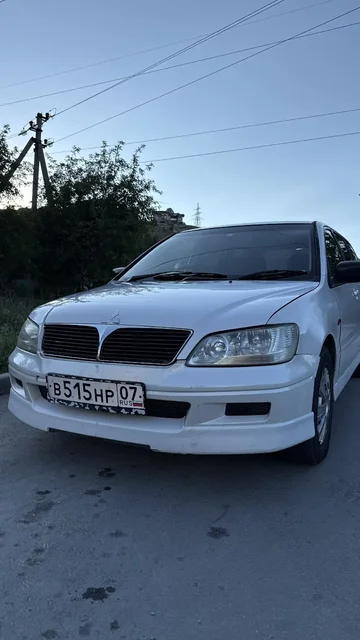 Mitsubishi Lancer Cedia 1.8 GDI, 2002 г. - Мопеды и скутеры в Неизвестно