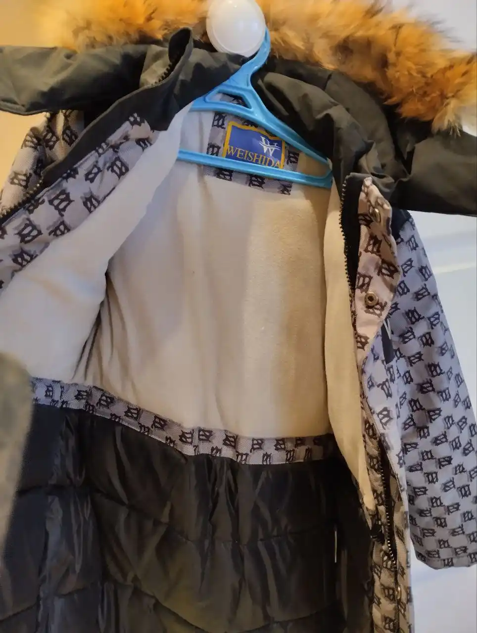 Удлинённая зимняя куртка для мальчика