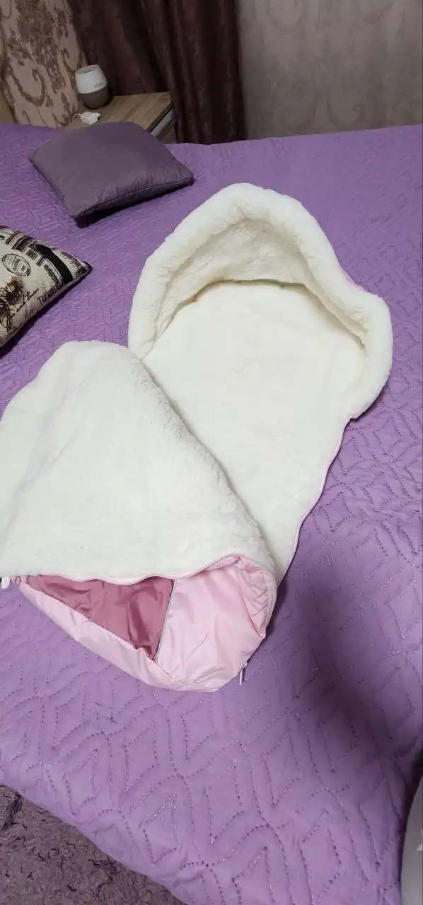 Тёплый конверт на овчине в идеальном состоянии