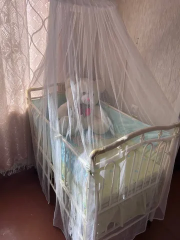 Металлическая детская кроватка с маятником и колыбелькой - частное объявление в Ангарск