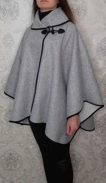 Стильное пончо серого цвета с черной окантовкой - Пончо в Белгород