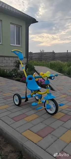 Продам детский велосипед с родительской ручкой - частное объявление в Белгород