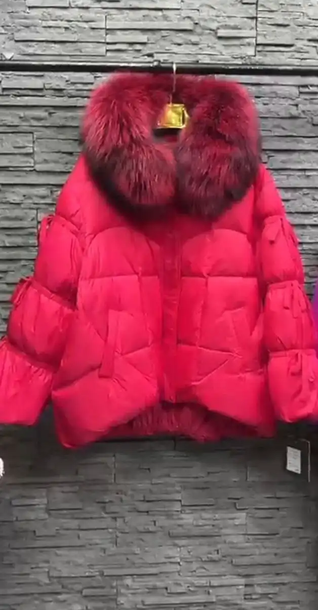 Стильная куртка-пуховик с бантиками и капюшоном