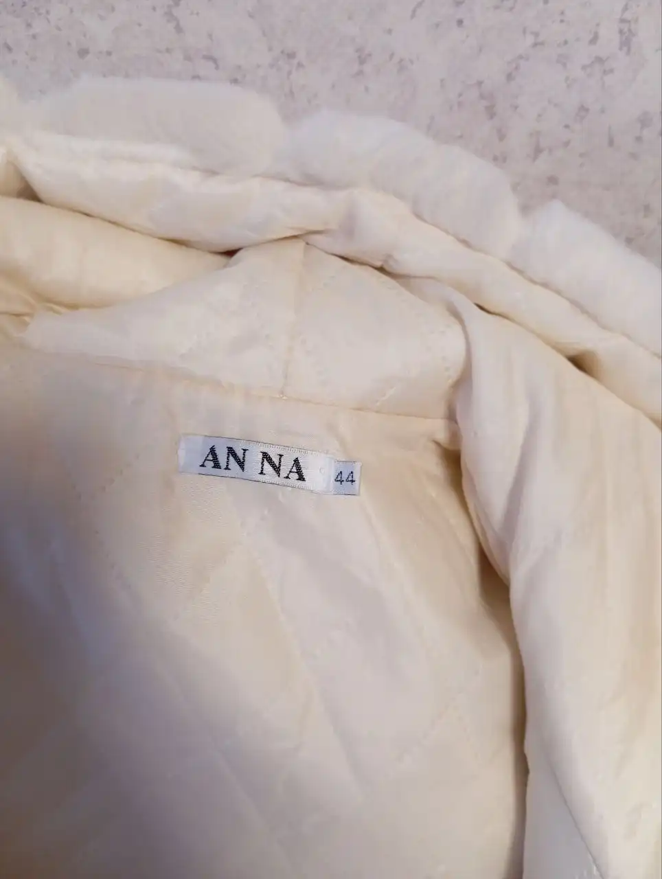 Детская одежда маломерит искусственный мех молочного цвета