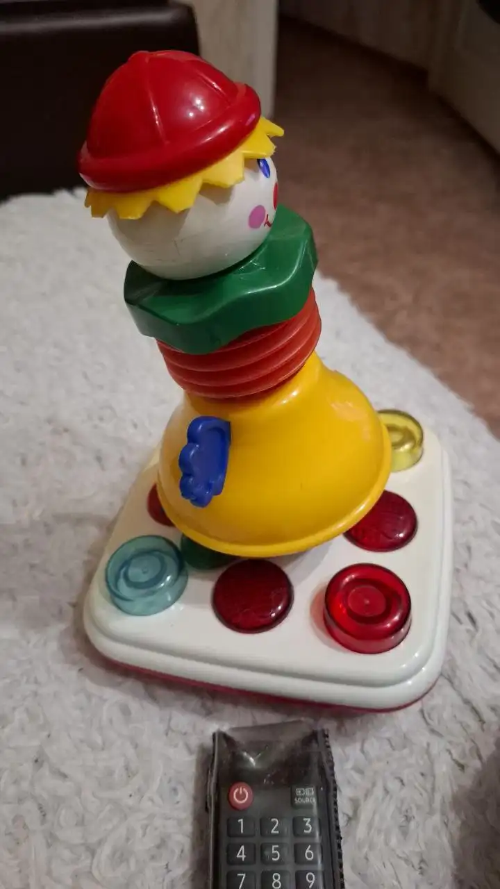 Юла сьемная поющая для моторики рук ребенка