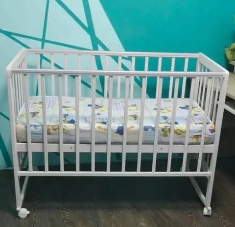Детская кроватка Milana с колесом-качалкой - Товары для детей в Новая Усмань