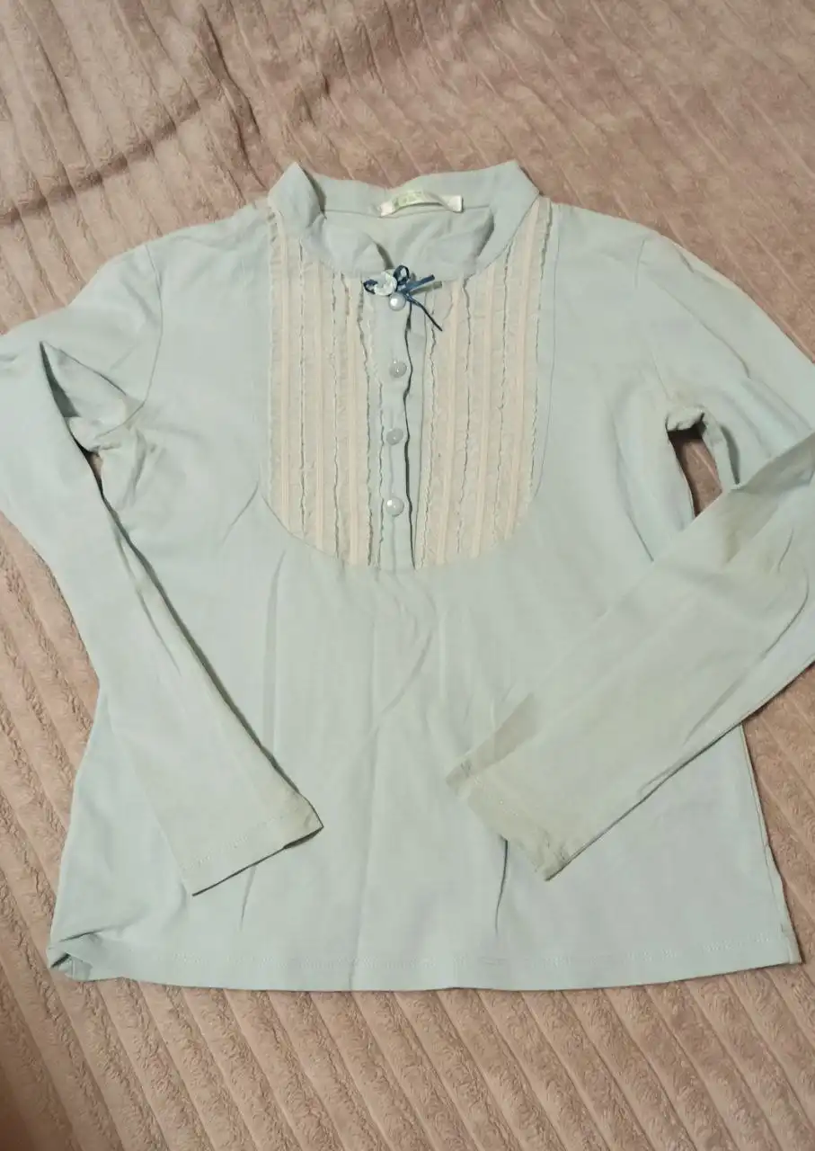 Блузка трикотажная голубая