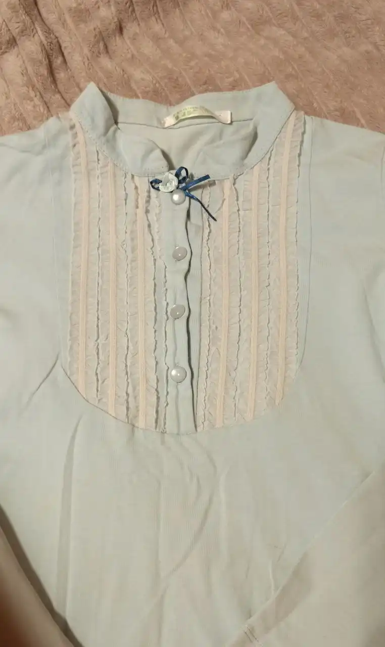 Блузка трикотажная голубая