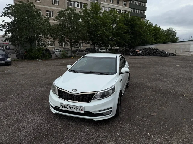 Kia Rio 3 рестайлинг, 2015 - BMW X7 в Москва