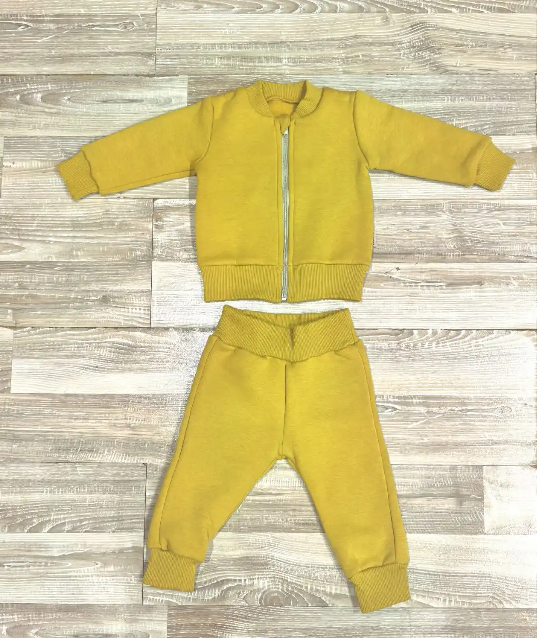 Детская верхняя одежда: костюм и комбинезон