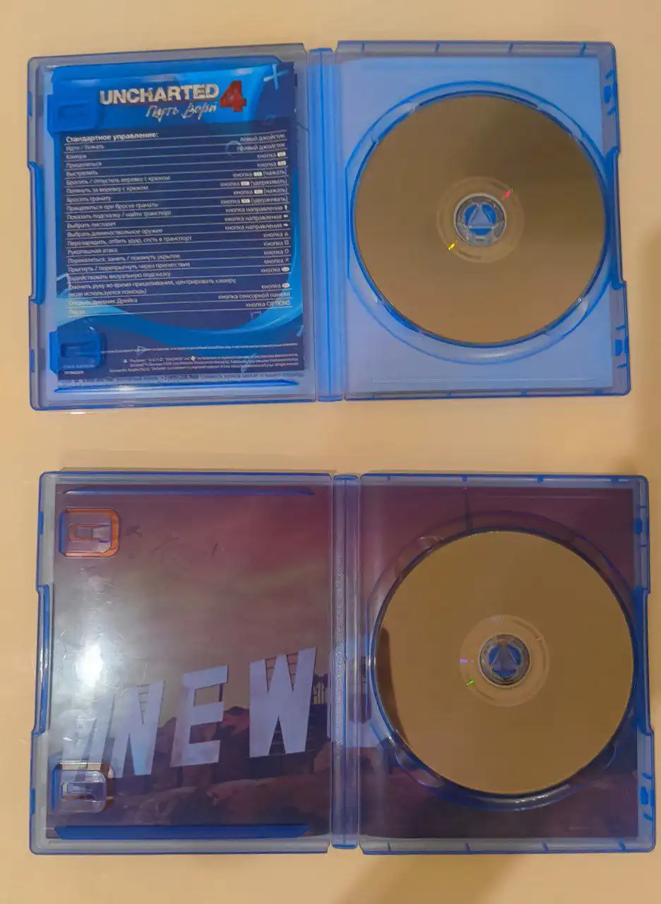 Продам PS4 с 2 геймпадами и играми