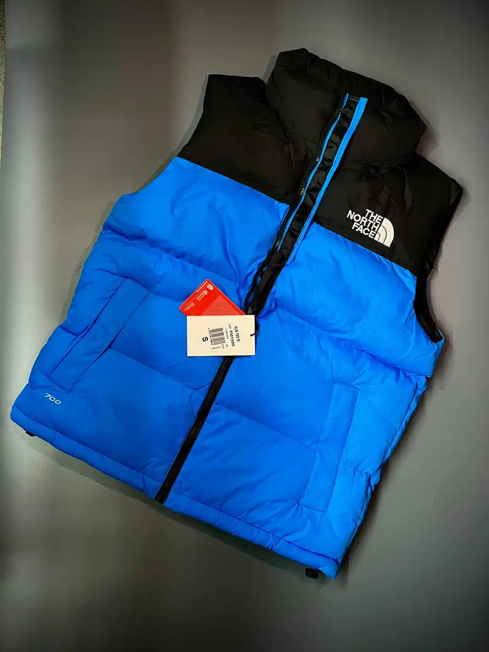 Сочные яркие жилетки The North Face синего и оранжевого цвета - Верхняя одежда (Одежда) в Казань