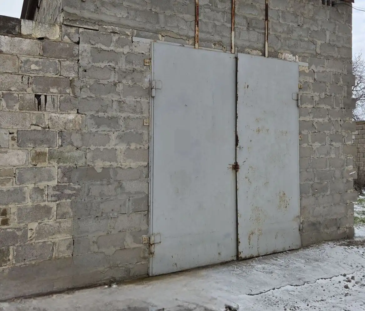 Продажа гаража-склада 65 кв.м в Мариуполе - Гаражи и парковки (Недвижимость) в Мариуполь