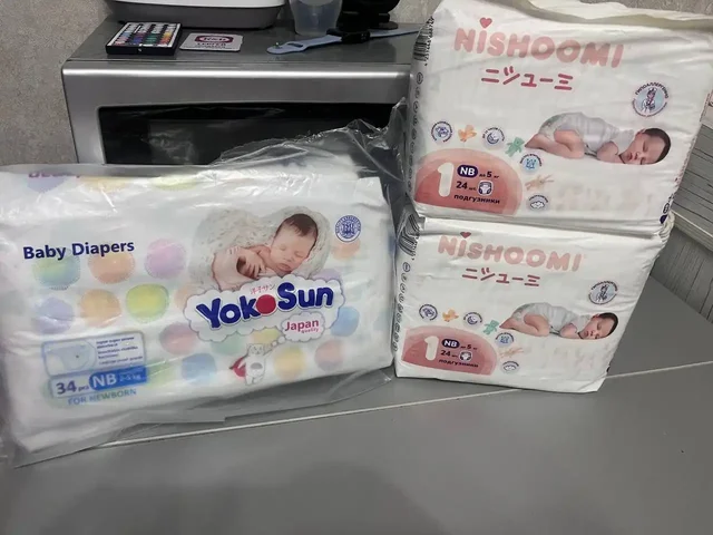 Продам памперсы и костюмы - Одежда для детей в Самара