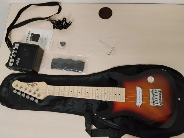 Продажа новой компактной электрогитары с комплектом - Электронные сигареты/вейпы в Челябинск