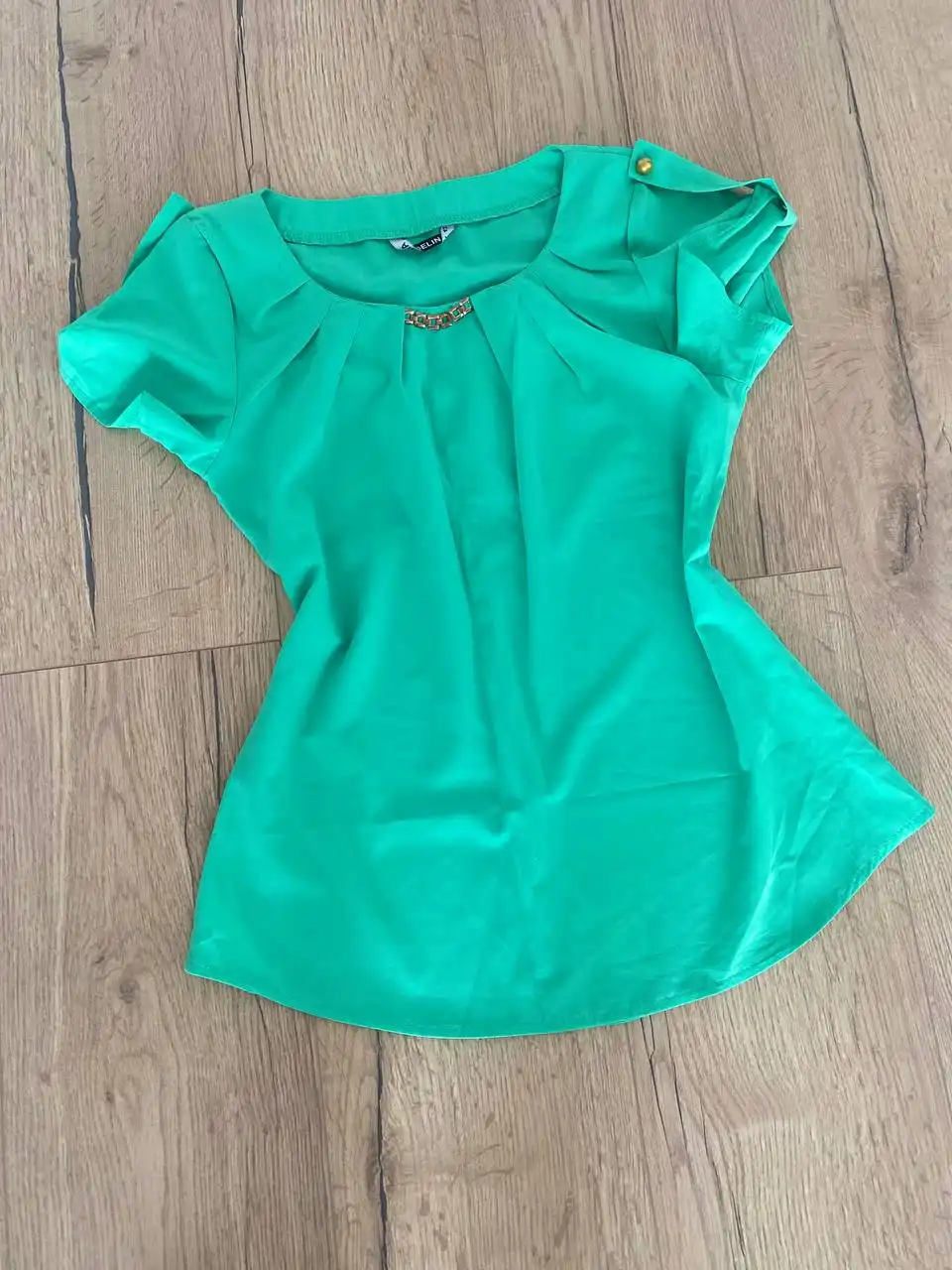 Блузка размер 42 в отличном состоянии