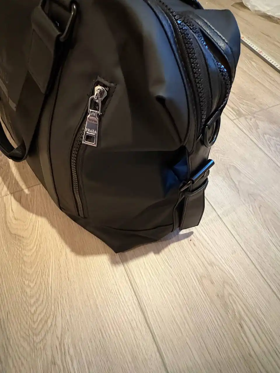 Женская сумка и дорожная сумка в упаковке