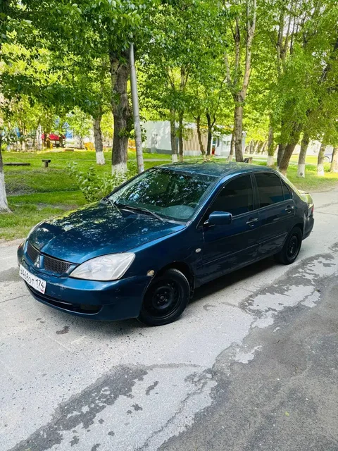 Lancer 2006 - Услуги по ремонту и обслуживанию в Тюмень
