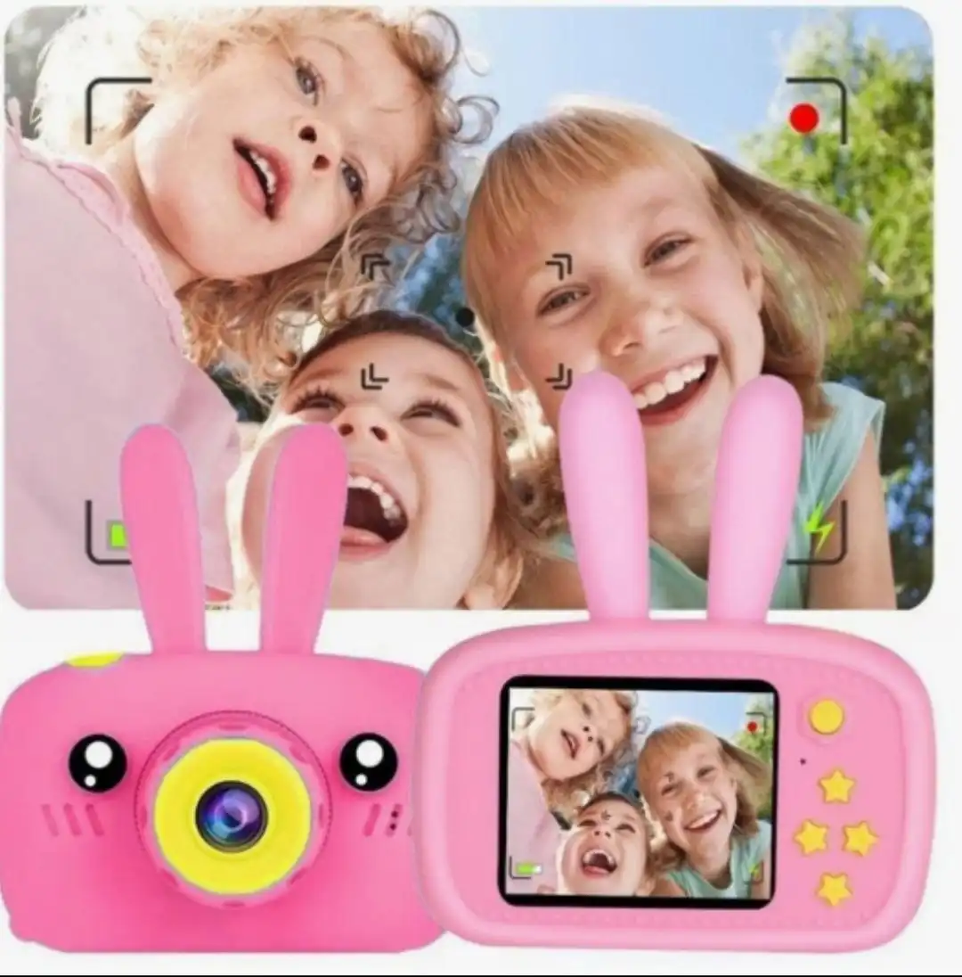 Детские игры и фотоаппарат в коробке