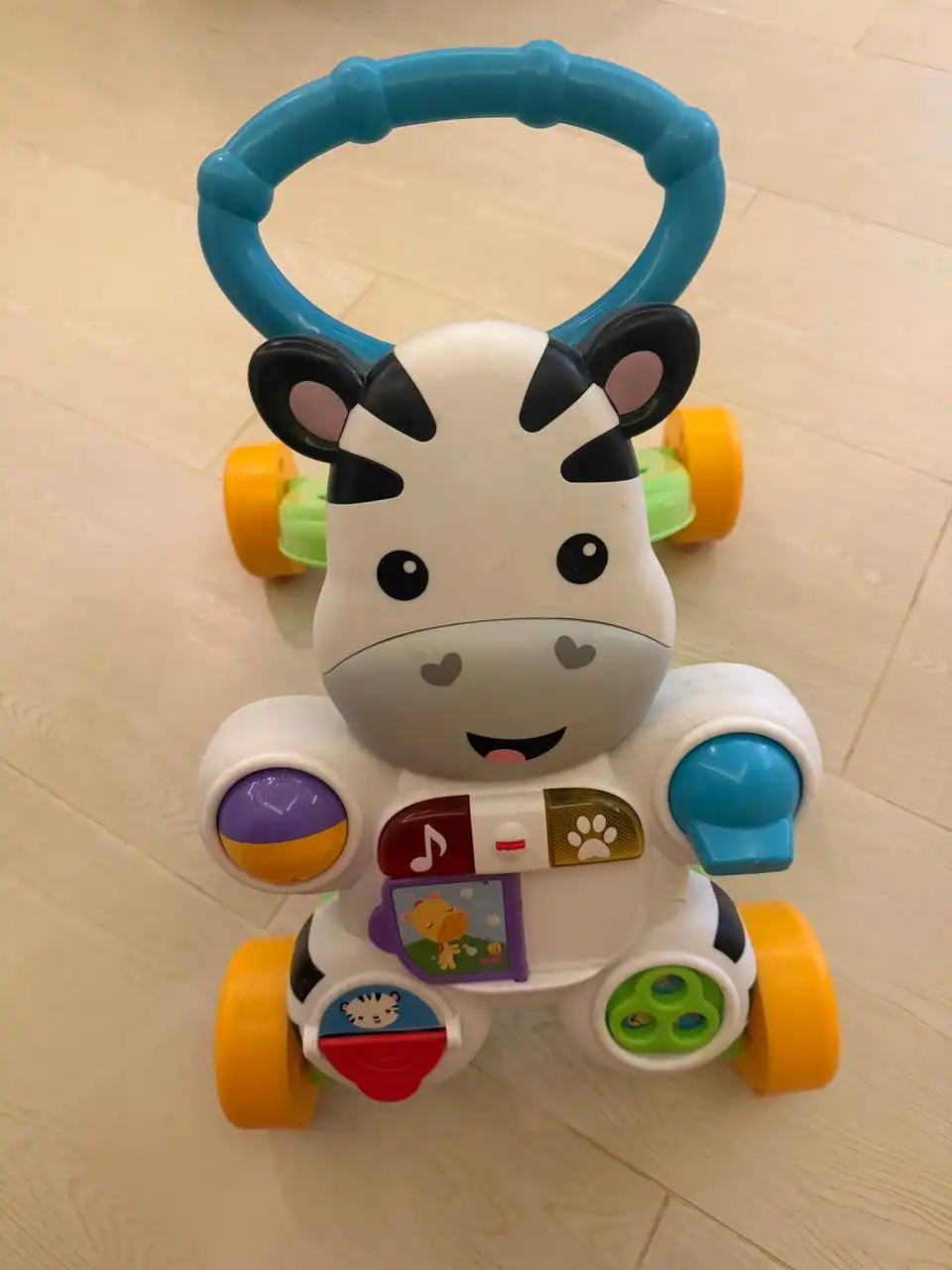 Каталка FisherPrice музыкальная для первых шагов