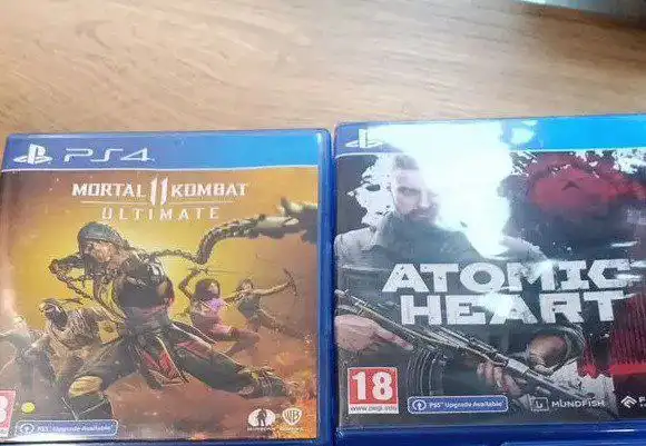 Продам 2 диска игр для PS4: Atomic Heart и Mortal Kombat 11