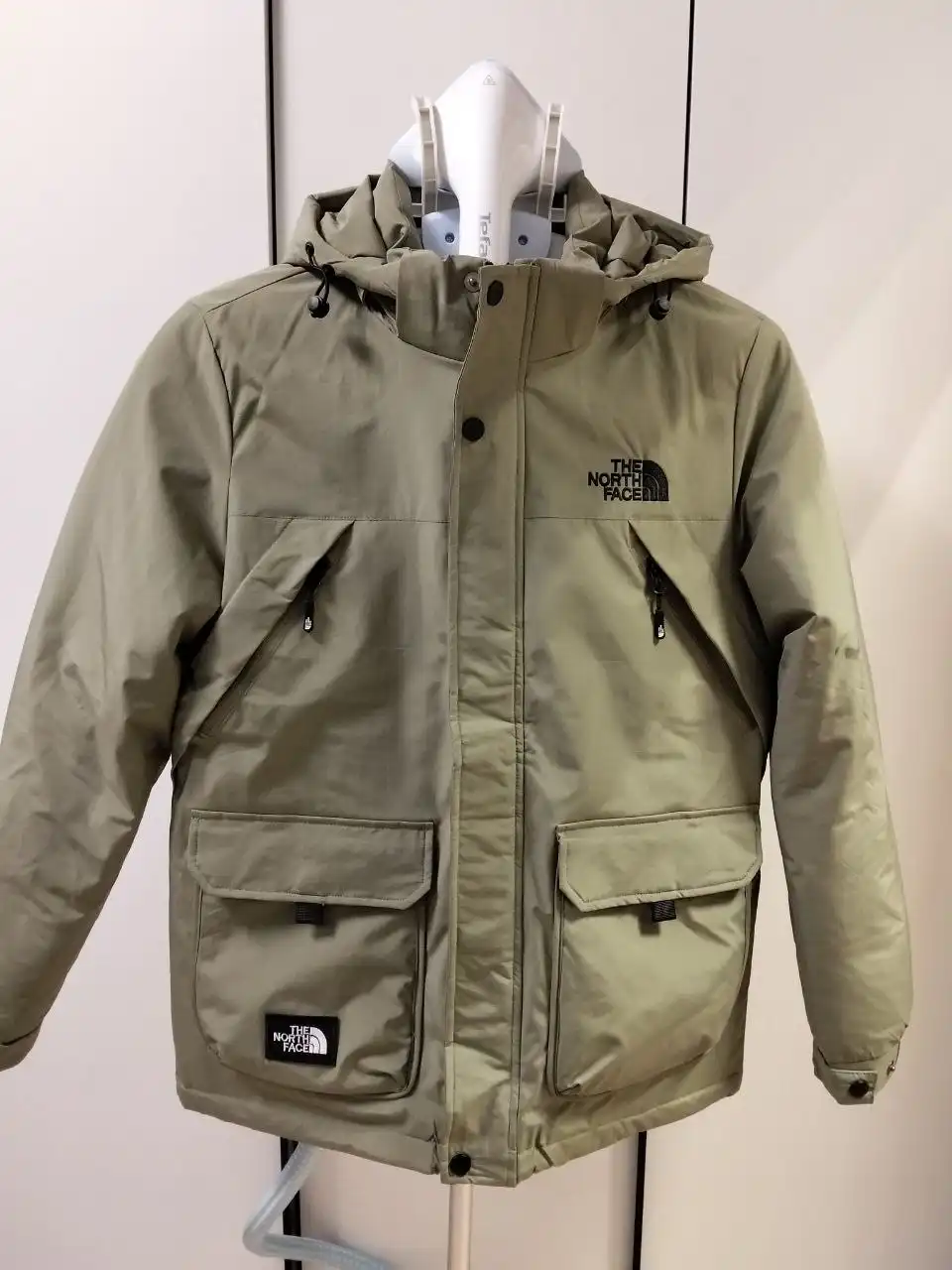Продажа новых парок The North Face и Kappa