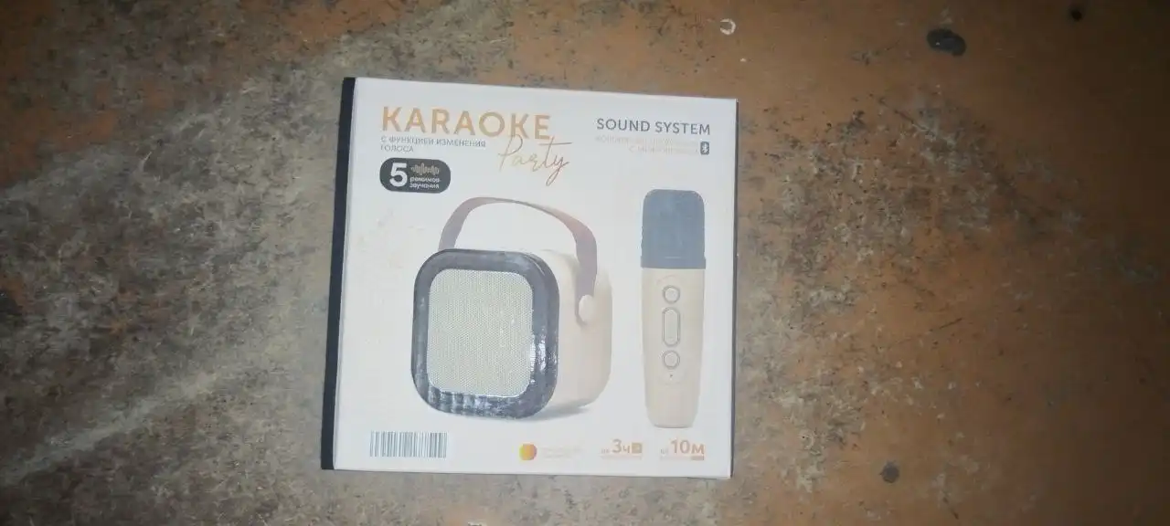 Беспроводная колонка с микрофоном розового цвета